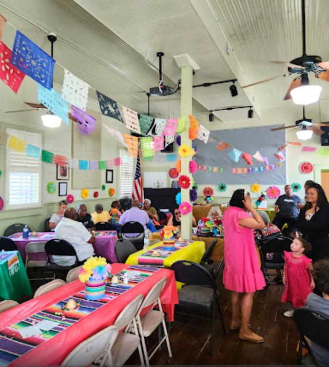 Photo of a festive party at the Kerr Community Center