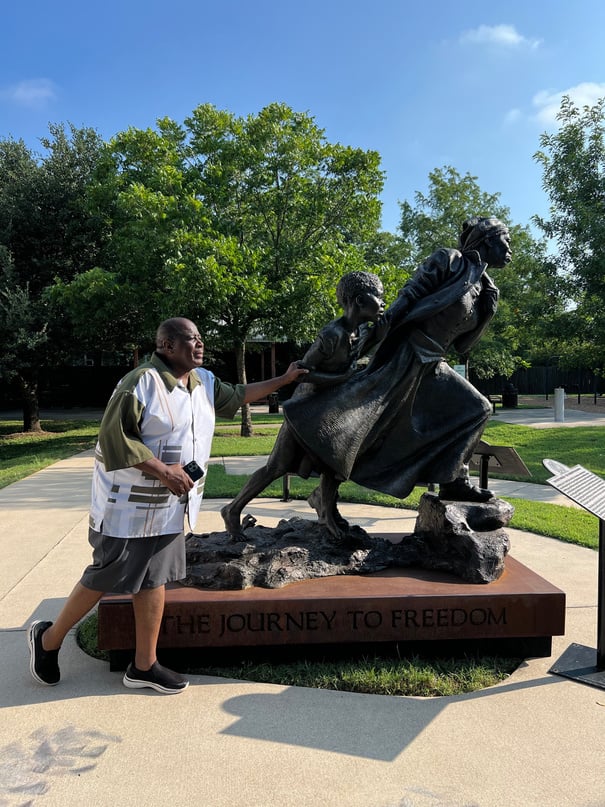 Kerr Chairman in front of Harriet Tubman statue