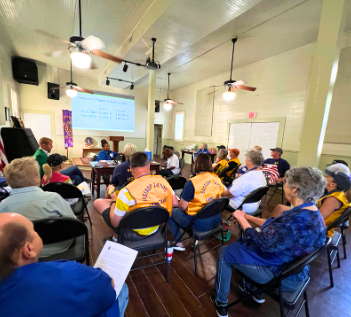 A meeting taking place at the Kerr Community Center